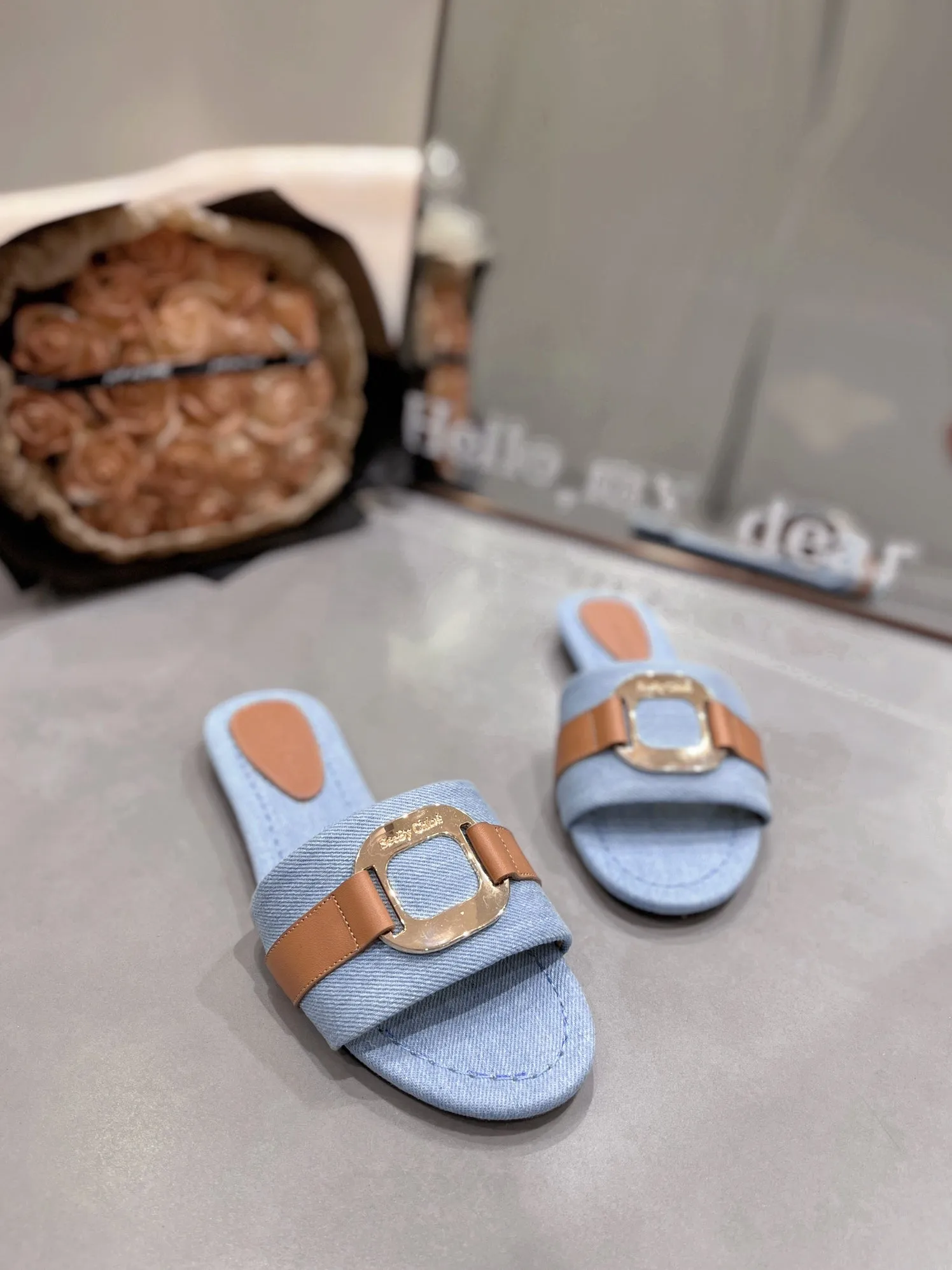 CHLOÉ SLIDE MULE IN LIGHT BLUE DENIM AND BROWN CALFSKIN GOLD HARDWARE